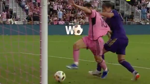 Rodrigo Schlegel pictured (right) pulling the jersey of Lionel Messi in an unsuccessful effort to stop the Inter Miami captain from scoring against Orlando City in an MLS game in March 2024
